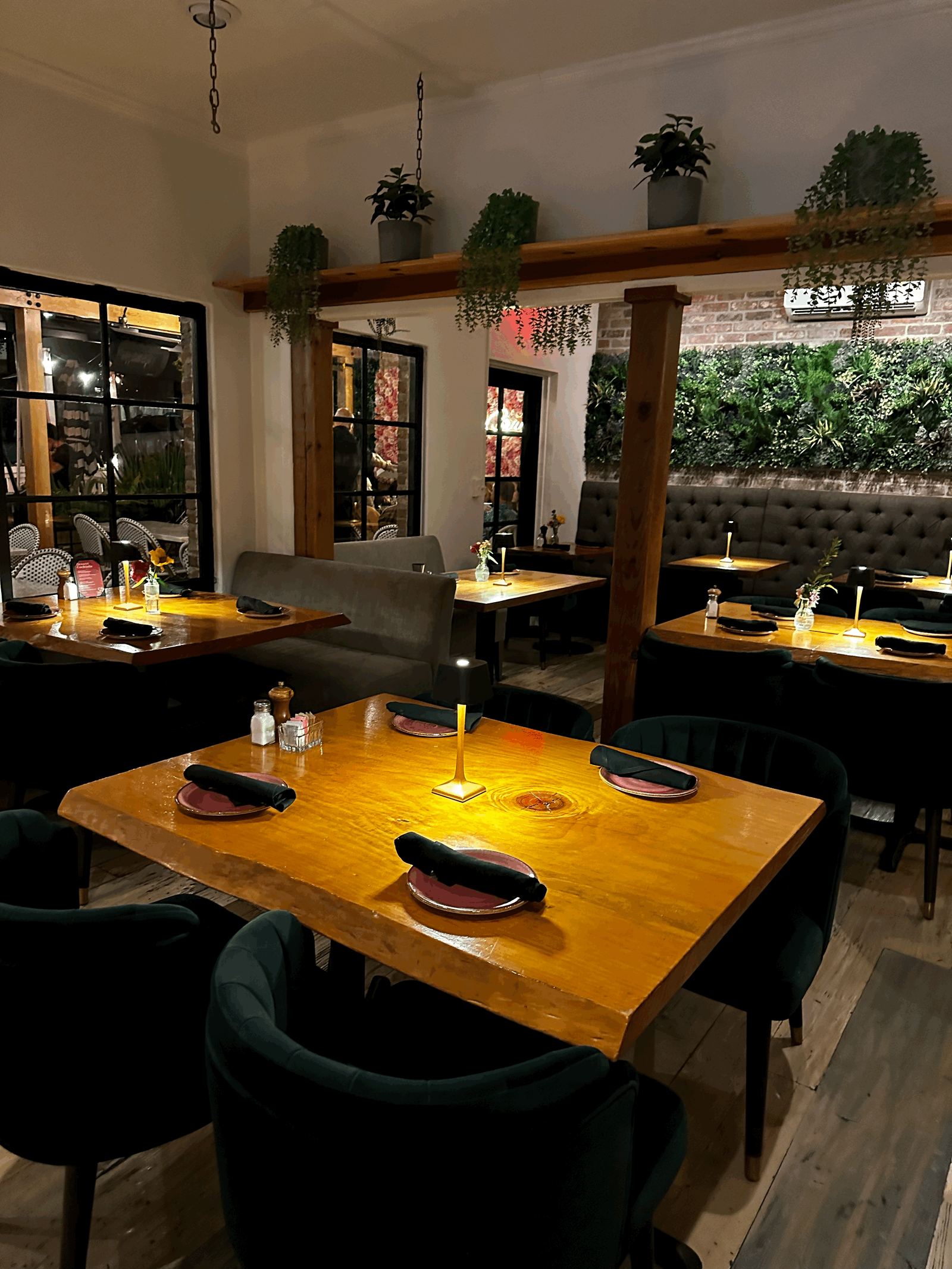 The front dining room, tables set for the evening